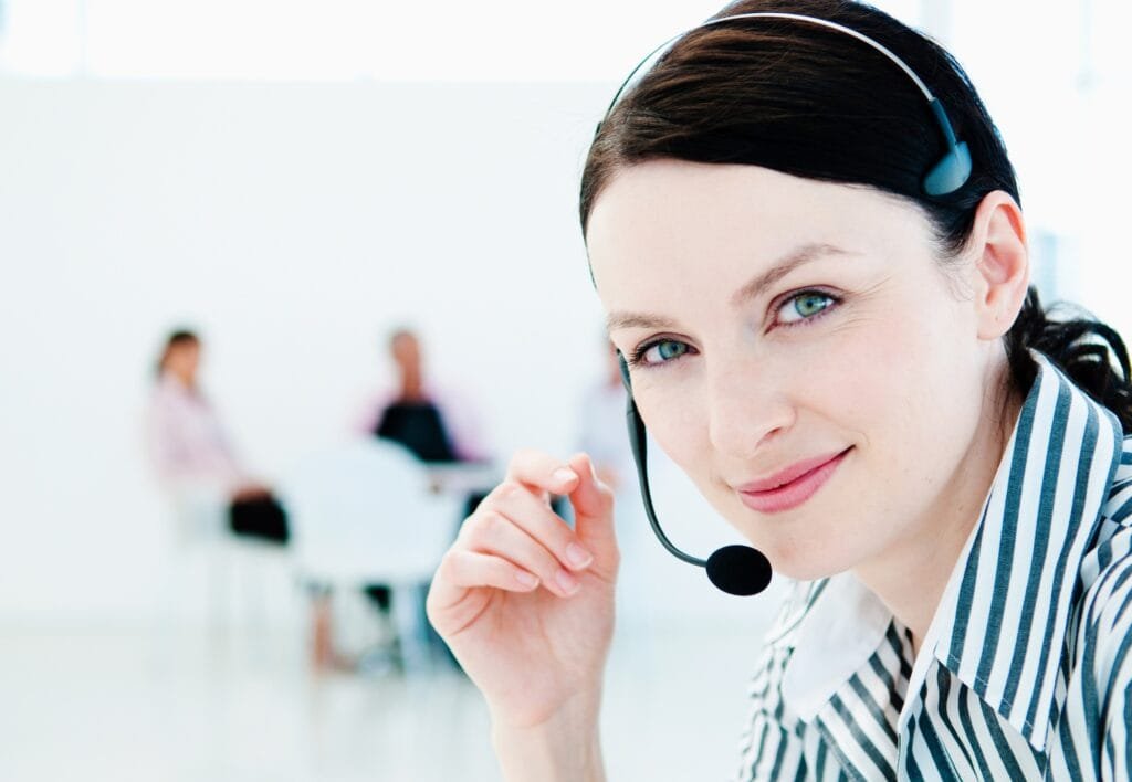 Confident tele sales woman and team